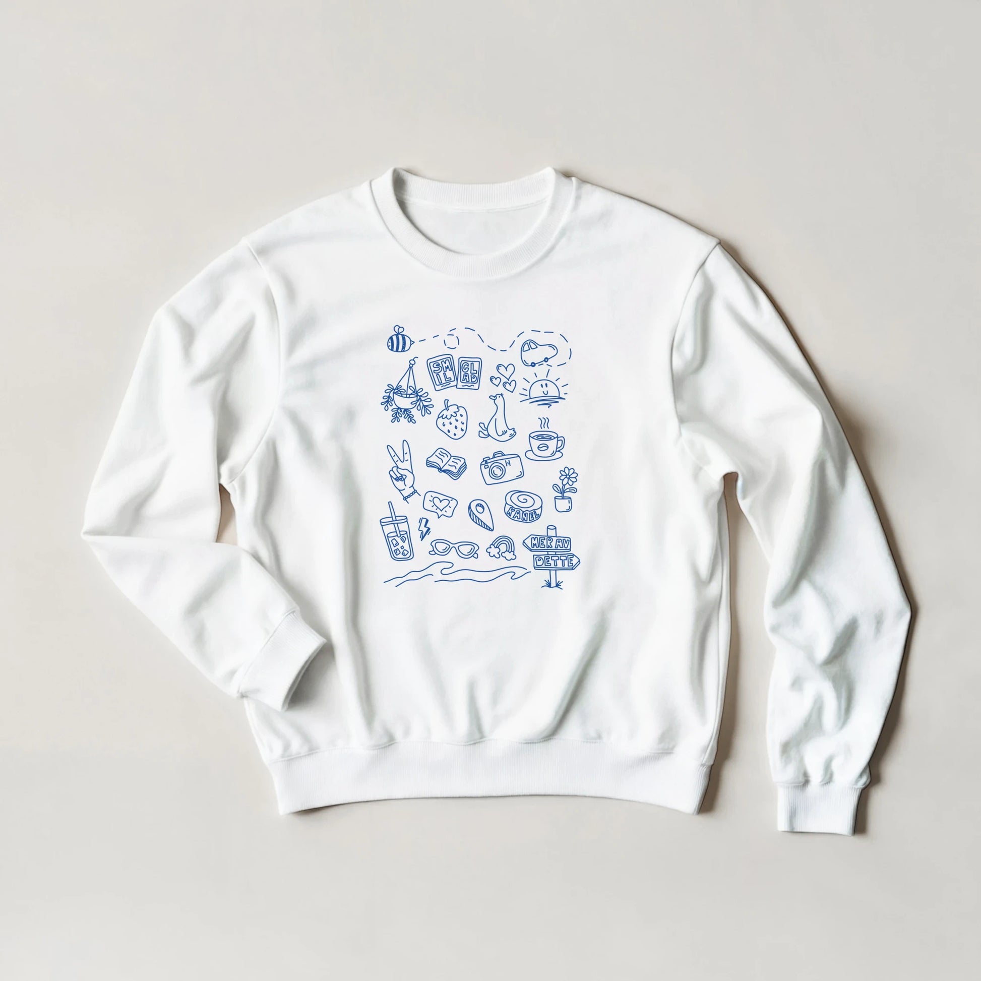 T-skjorte med trykk “Mer av dette” fra Anda Studio