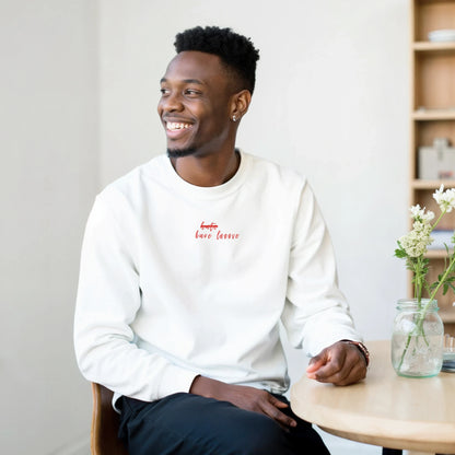 Genser med trykk “No hate, bare løøve” fra Anda Studio